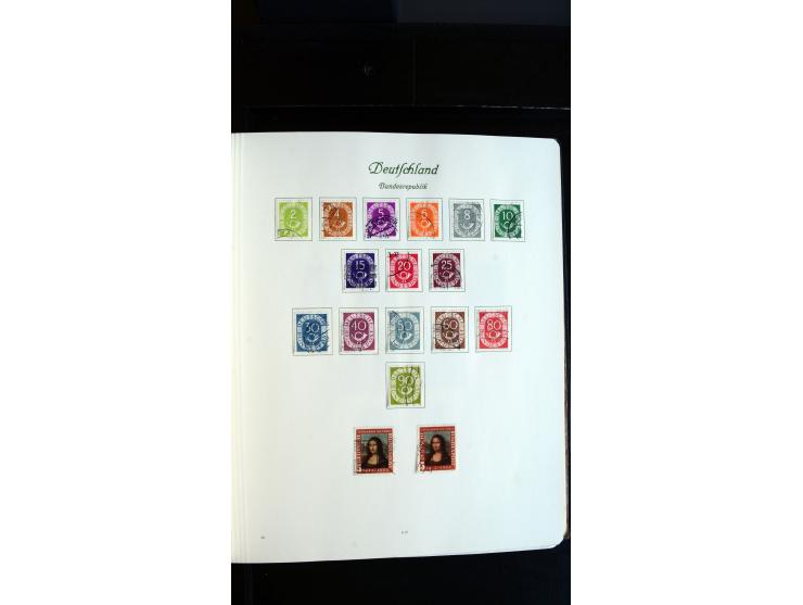1948/65, gestempelte Sammlungen von Bund, Berlin, DDR und Saarland in zwei Vordruckalben, in den Hauptnummern bis auf Berlin 