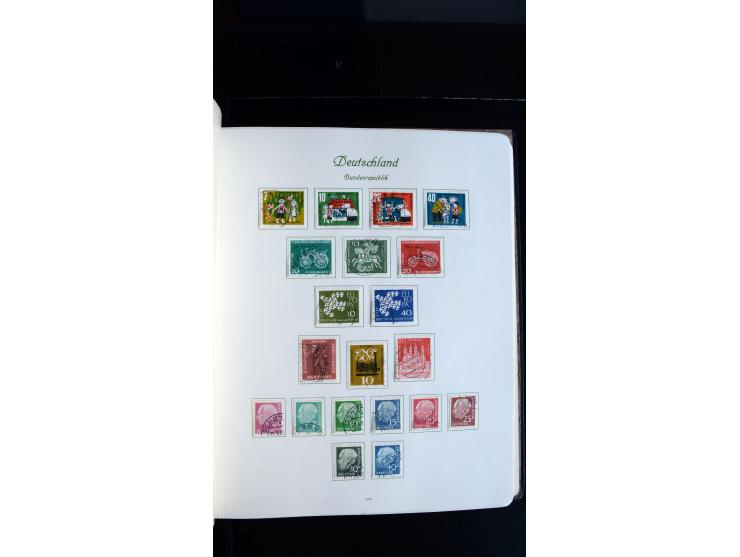 1948/65, gestempelte Sammlungen von Bund, Berlin, DDR und Saarland in zwei Vordruckalben, in den Hauptnummern bis auf Berlin 