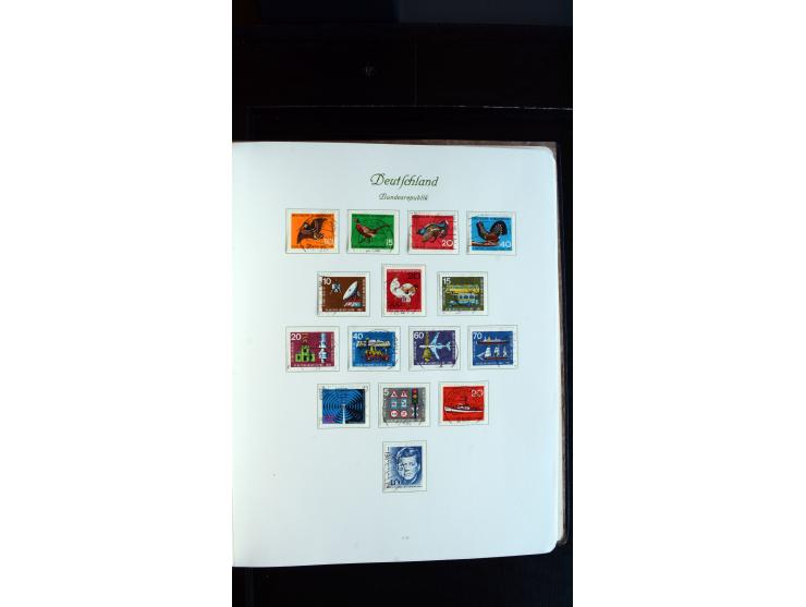 1948/65, gestempelte Sammlungen von Bund, Berlin, DDR und Saarland in zwei Vordruckalben, in den Hauptnummern bis auf Berlin 