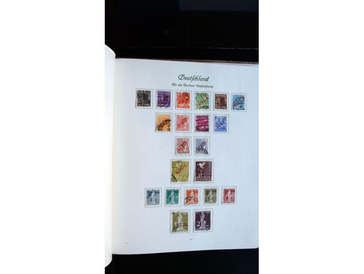 1948/65, gestempelte Sammlungen von Bund, Berlin, DDR und Saarland in zwei Vordruckalben, in den Hauptnummern bis auf Berlin 
