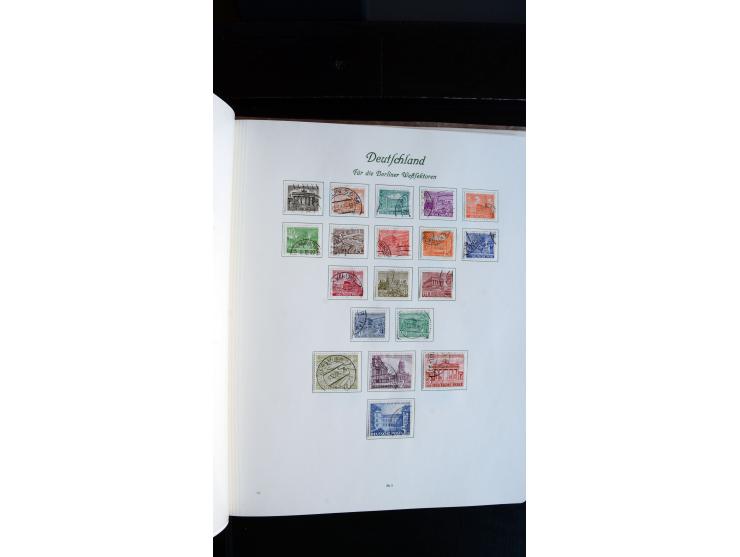 1948/65, gestempelte Sammlungen von Bund, Berlin, DDR und Saarland in zwei Vordruckalben, in den Hauptnummern bis auf Berlin 
