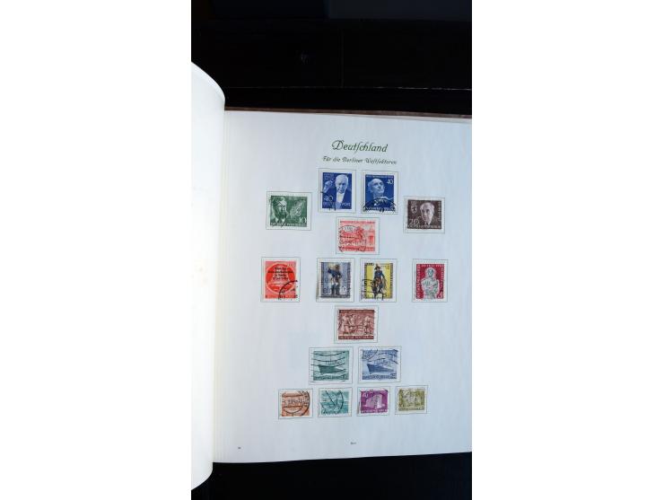 1948/65, gestempelte Sammlungen von Bund, Berlin, DDR und Saarland in zwei Vordruckalben, in den Hauptnummern bis auf Berlin 