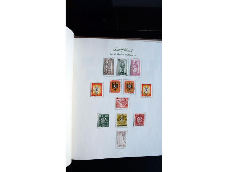 1948/65, gestempelte Sammlungen von Bund, Berlin, DDR und Saarland in zwei Vordruckalben, in den Hauptnummern bis auf Berlin 