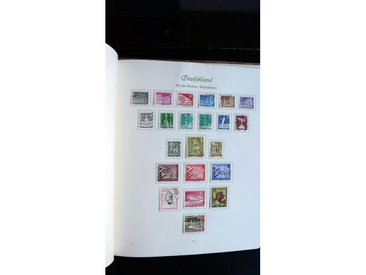 1948/65, gestempelte Sammlungen von Bund, Berlin, DDR und Saarland in zwei Vordruckalben, in den Hauptnummern bis auf Berlin 