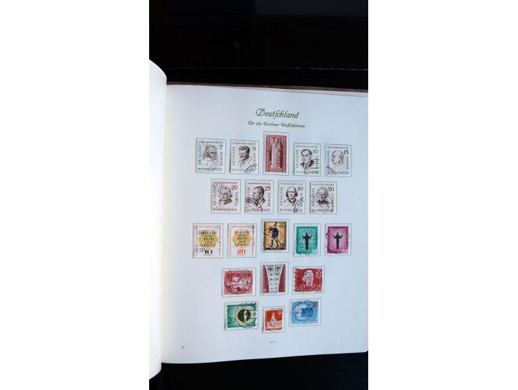 1948/65, gestempelte Sammlungen von Bund, Berlin, DDR und Saarland in zwei Vordruckalben, in den Hauptnummern bis auf Berlin 