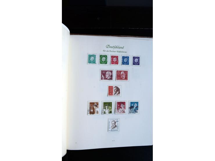 1948/65, gestempelte Sammlungen von Bund, Berlin, DDR und Saarland in zwei Vordruckalben, in den Hauptnummern bis auf Berlin 