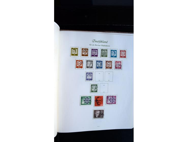 1948/65, gestempelte Sammlungen von Bund, Berlin, DDR und Saarland in zwei Vordruckalben, in den Hauptnummern bis auf Berlin 