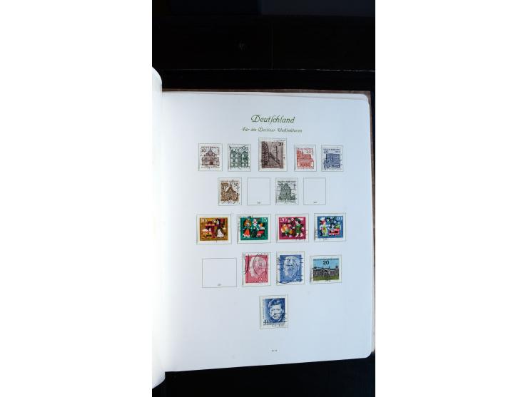 1948/65, gestempelte Sammlungen von Bund, Berlin, DDR und Saarland in zwei Vordruckalben, in den Hauptnummern bis auf Berlin 