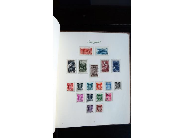 1948/65, gestempelte Sammlungen von Bund, Berlin, DDR und Saarland in zwei Vordruckalben, in den Hauptnummern bis auf Berlin 