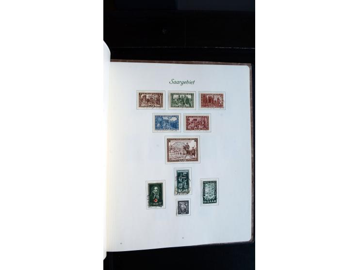 1948/65, gestempelte Sammlungen von Bund, Berlin, DDR und Saarland in zwei Vordruckalben, in den Hauptnummern bis auf Berlin 