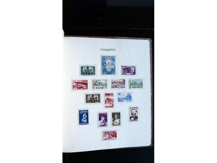 1948/65, gestempelte Sammlungen von Bund, Berlin, DDR und Saarland in zwei Vordruckalben, in den Hauptnummern bis auf Berlin 