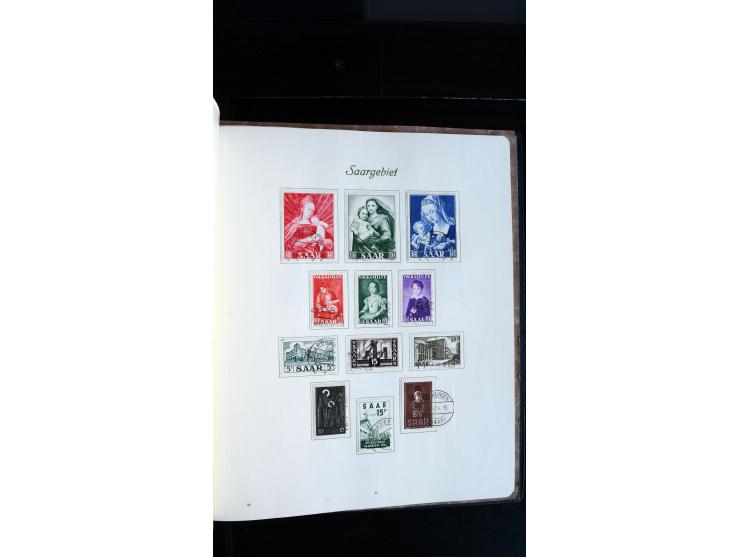 1948/65, gestempelte Sammlungen von Bund, Berlin, DDR und Saarland in zwei Vordruckalben, in den Hauptnummern bis auf Berlin 