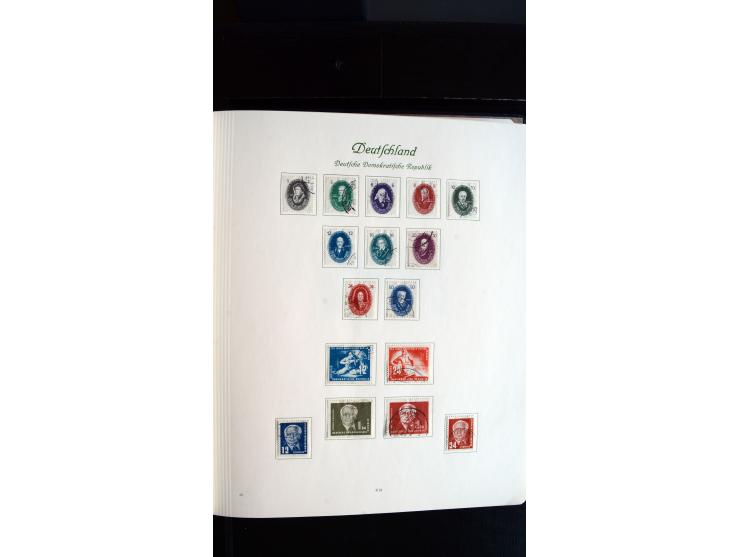 1948/65, gestempelte Sammlungen von Bund, Berlin, DDR und Saarland in zwei Vordruckalben, in den Hauptnummern bis auf Berlin 