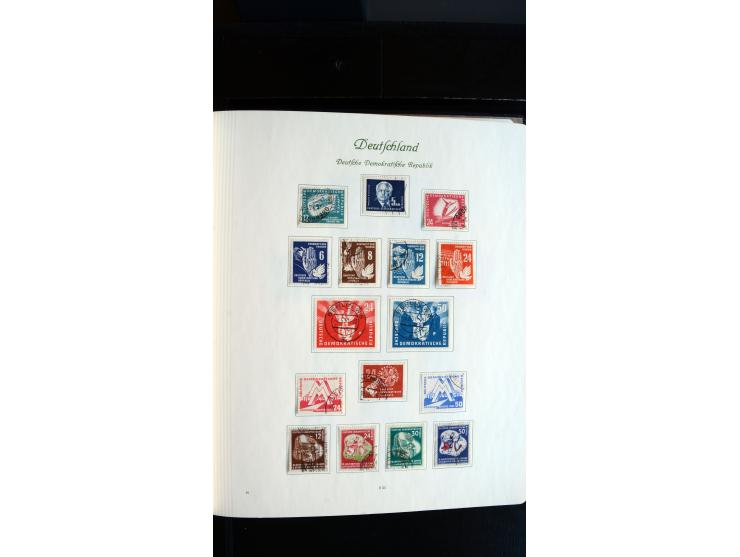1948/65, gestempelte Sammlungen von Bund, Berlin, DDR und Saarland in zwei Vordruckalben, in den Hauptnummern bis auf Berlin 