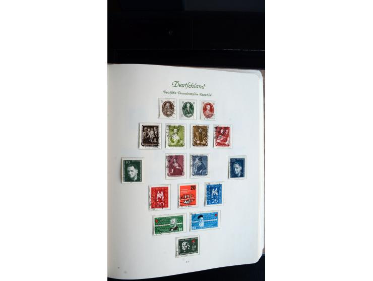 1948/65, gestempelte Sammlungen von Bund, Berlin, DDR und Saarland in zwei Vordruckalben, in den Hauptnummern bis auf Berlin 