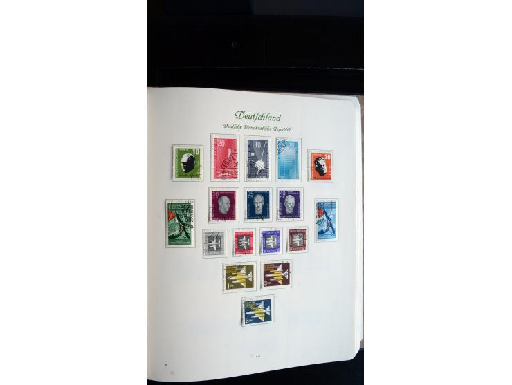 1948/65, gestempelte Sammlungen von Bund, Berlin, DDR und Saarland in zwei Vordruckalben, in den Hauptnummern bis auf Berlin 