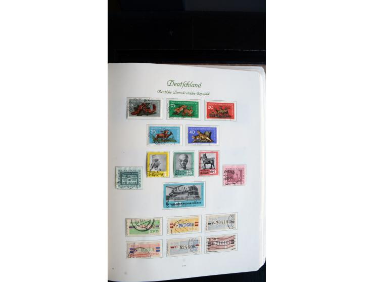 1948/65, gestempelte Sammlungen von Bund, Berlin, DDR und Saarland in zwei Vordruckalben, in den Hauptnummern bis auf Berlin 