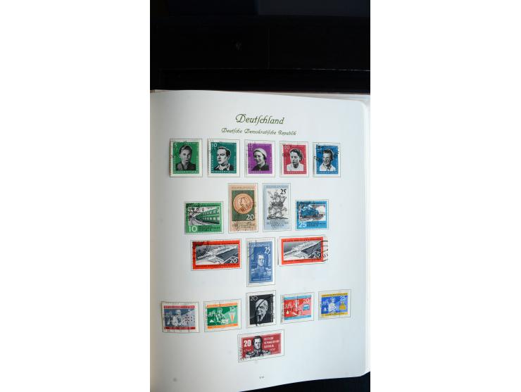 1948/65, gestempelte Sammlungen von Bund, Berlin, DDR und Saarland in zwei Vordruckalben, in den Hauptnummern bis auf Berlin 
