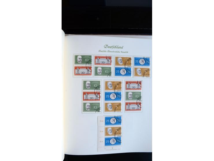 1948/65, gestempelte Sammlungen von Bund, Berlin, DDR und Saarland in zwei Vordruckalben, in den Hauptnummern bis auf Berlin 