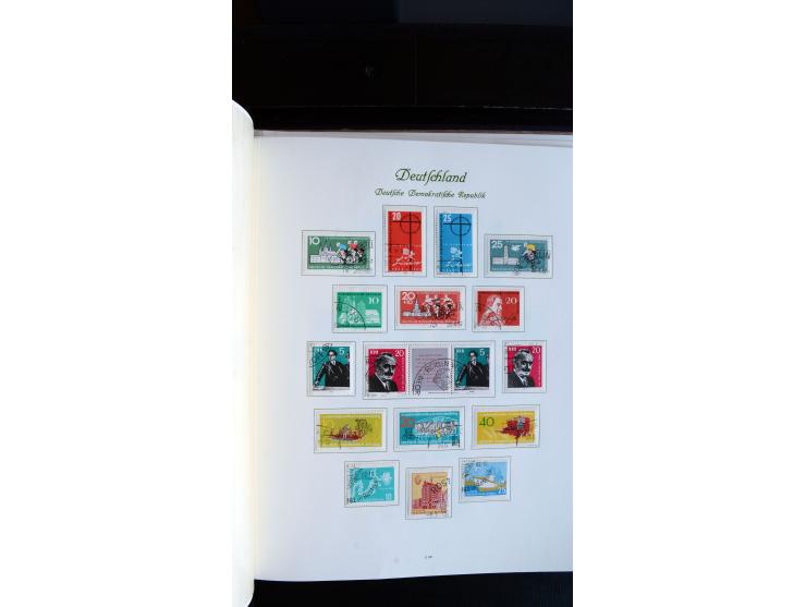 1948/65, gestempelte Sammlungen von Bund, Berlin, DDR und Saarland in zwei Vordruckalben, in den Hauptnummern bis auf Berlin 