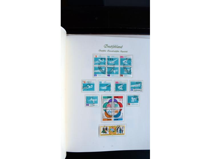 1948/65, gestempelte Sammlungen von Bund, Berlin, DDR und Saarland in zwei Vordruckalben, in den Hauptnummern bis auf Berlin 