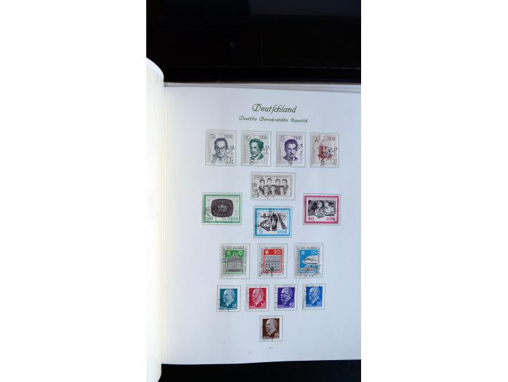 1948/65, gestempelte Sammlungen von Bund, Berlin, DDR und Saarland in zwei Vordruckalben, in den Hauptnummern bis auf Berlin 