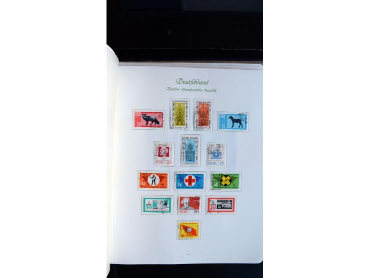 1948/65, gestempelte Sammlungen von Bund, Berlin, DDR und Saarland in zwei Vordruckalben, in den Hauptnummern bis auf Berlin 