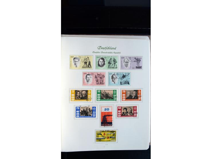1948/65, gestempelte Sammlungen von Bund, Berlin, DDR und Saarland in zwei Vordruckalben, in den Hauptnummern bis auf Berlin 