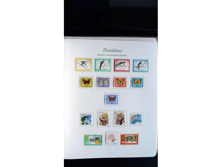 1948/65, gestempelte Sammlungen von Bund, Berlin, DDR und Saarland in zwei Vordruckalben, in den Hauptnummern bis auf Berlin 