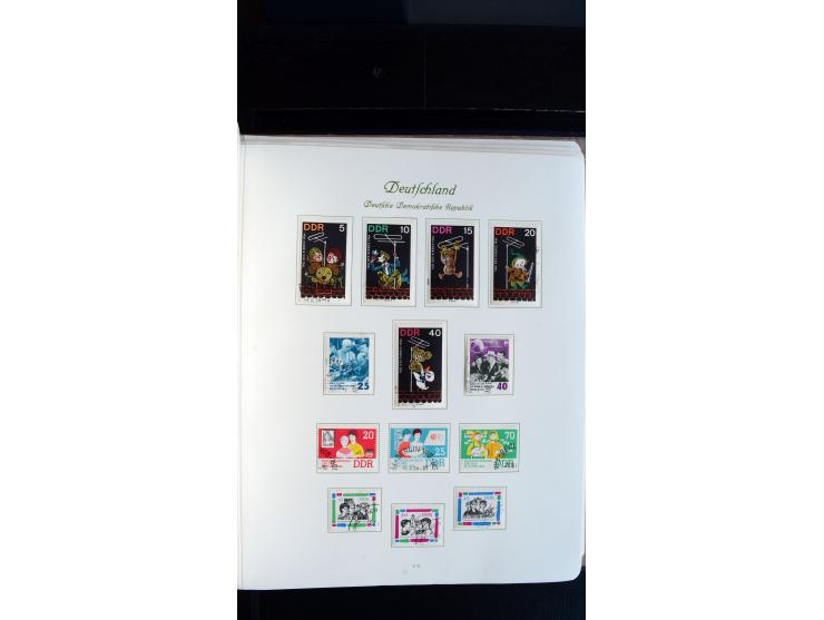 1948/65, gestempelte Sammlungen von Bund, Berlin, DDR und Saarland in zwei Vordruckalben, in den Hauptnummern bis auf Berlin 