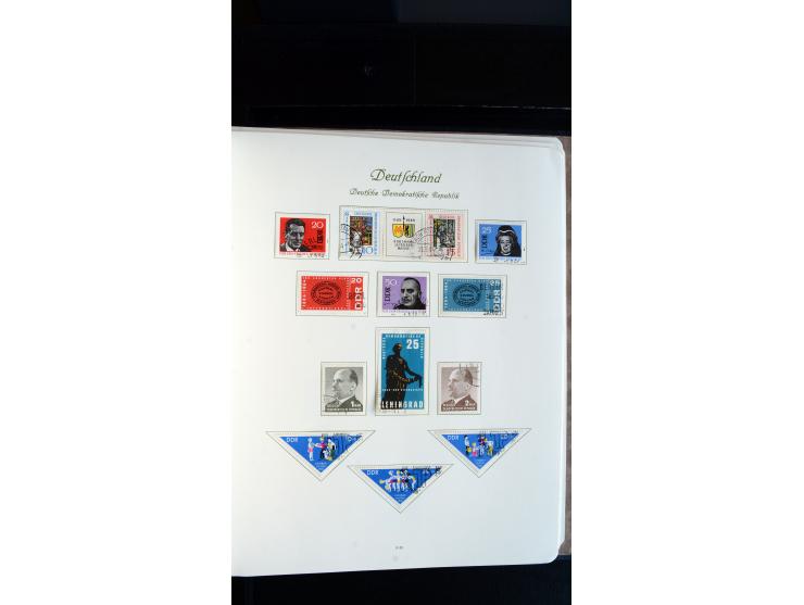 1948/65, gestempelte Sammlungen von Bund, Berlin, DDR und Saarland in zwei Vordruckalben, in den Hauptnummern bis auf Berlin 