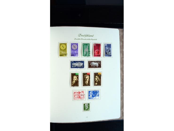 1948/65, gestempelte Sammlungen von Bund, Berlin, DDR und Saarland in zwei Vordruckalben, in den Hauptnummern bis auf Berlin 