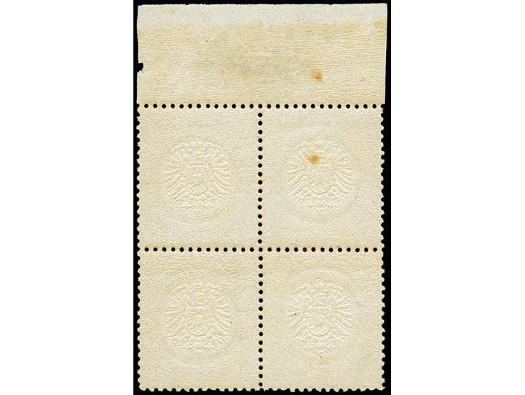 2 Kr. orange im Oberrand-4er-Block, farbfrisch, sehr gut geprägt und gut gezähnt, das obere Paar unmerklich ungebraucht, das 