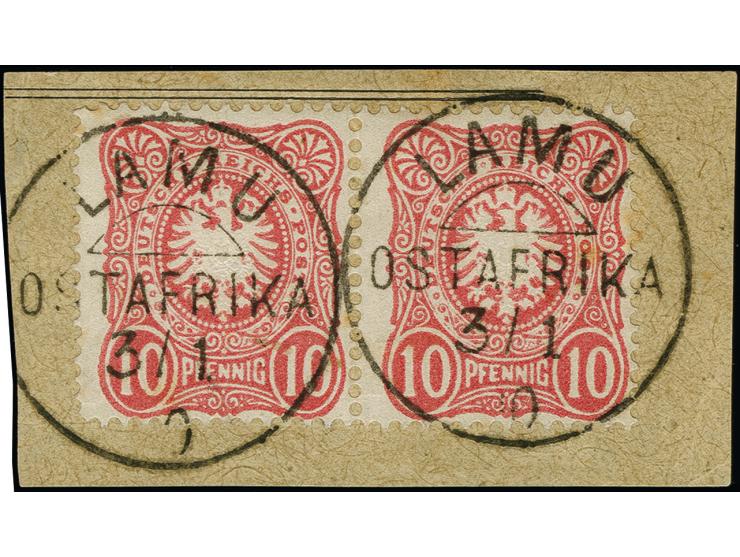 1888, 10 Pfennig dunkelrosarot im waagerechten Paar je mit klarem Stempel “LAMU OSTAFRIKA 3.1.90” auf Briefstück in einwandfr