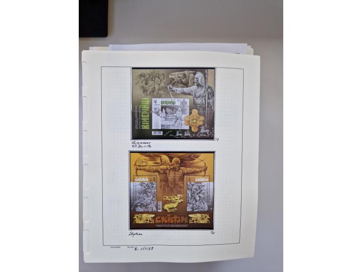 Eastern Europe: 1918/2021, extensive mint never hinged worldwide collection with many thematic stamps and souvenir sheets on 