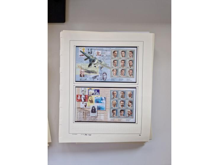 Eastern Europe: 1918/2021, extensive mint never hinged worldwide collection with many thematic stamps and souvenir sheets on 