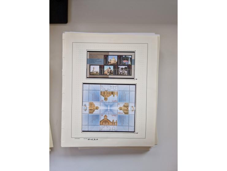 Eastern Europe: 1918/2021, extensive mint never hinged worldwide collection with many thematic stamps and souvenir sheets on 