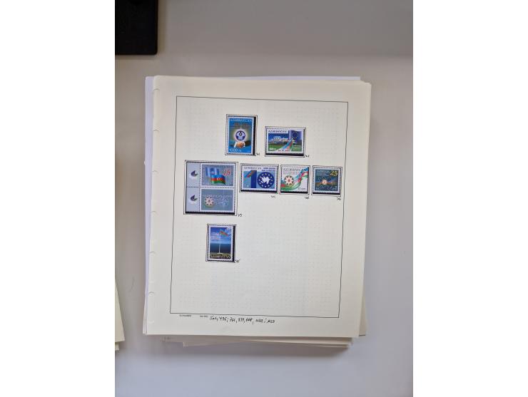 Eastern Europe: 1918/2021, extensive mint never hinged worldwide collection with many thematic stamps and souvenir sheets on 