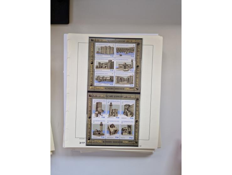 Eastern Europe: 1918/2021, extensive mint never hinged worldwide collection with many thematic stamps and souvenir sheets on 