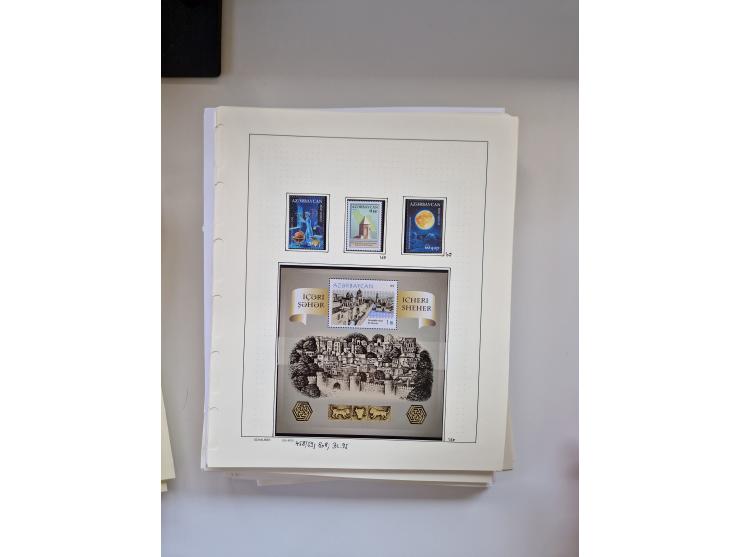 Eastern Europe: 1918/2021, extensive mint never hinged worldwide collection with many thematic stamps and souvenir sheets on 