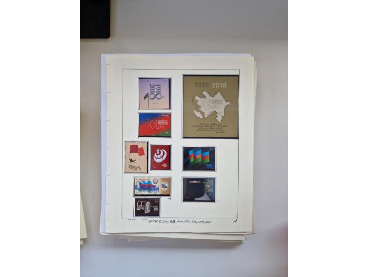 Eastern Europe: 1918/2021, extensive mint never hinged worldwide collection with many thematic stamps and souvenir sheets on 