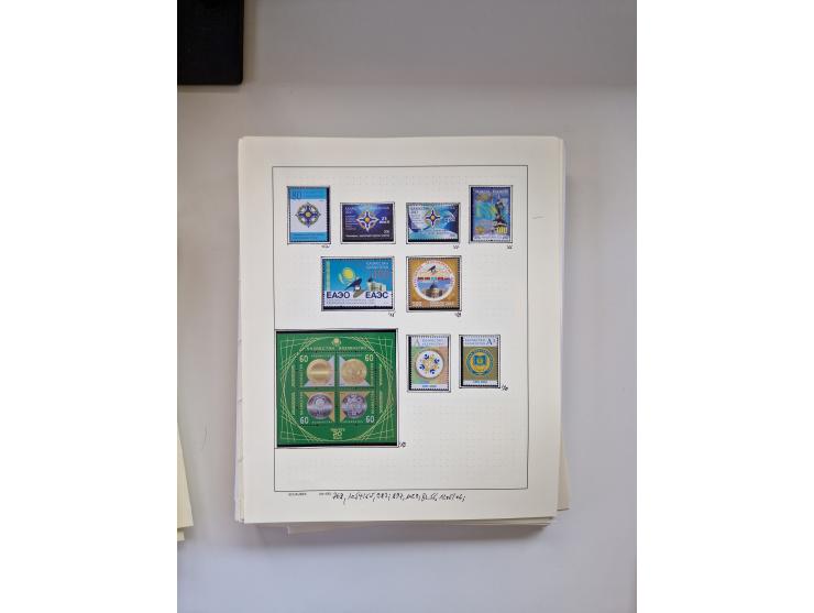 Eastern Europe: 1918/2021, extensive mint never hinged worldwide collection with many thematic stamps and souvenir sheets on 