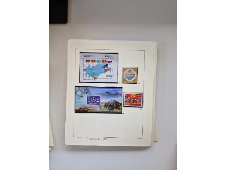 Eastern Europe: 1918/2021, extensive mint never hinged worldwide collection with many thematic stamps and souvenir sheets on 