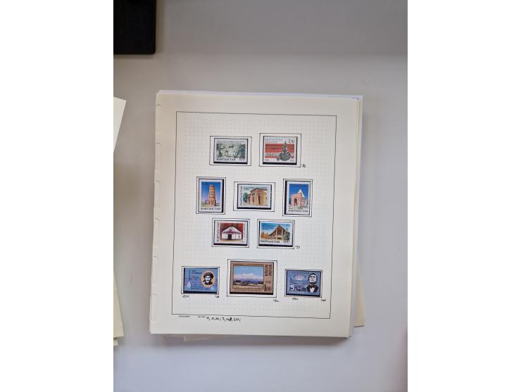 Eastern Europe: 1918/2021, extensive mint never hinged worldwide collection with many thematic stamps and souvenir sheets on 