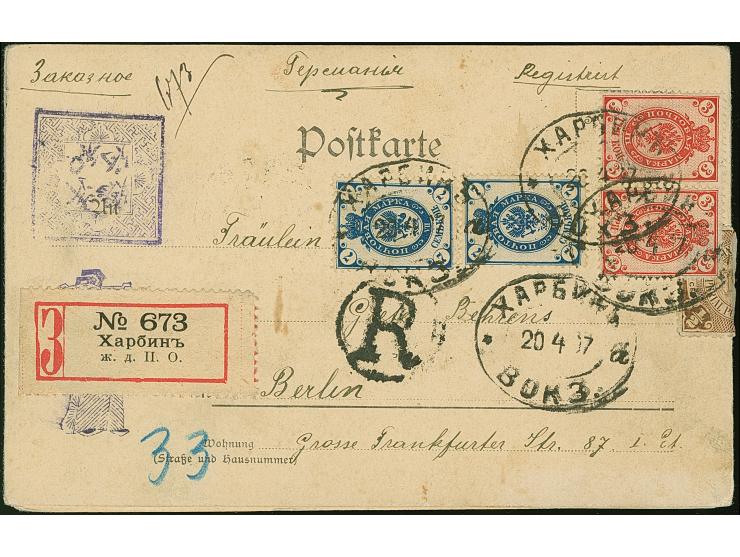 1917, Russland 3 Kop. lebhaftrosarot im waagerechten Paar und zwei Einzelmarken 7 Kop. dunkelblau je mit Ovalstempel “HARBIN 