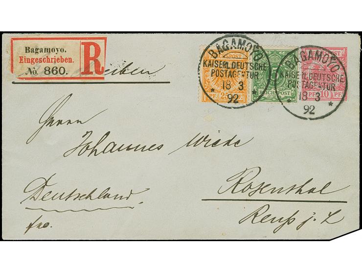 25 Pfg. gelborange mit 5 Pfg., als Zufrankatur auf Ganzsachenumschlag 10 Pfg., als R-Brief vom "BAGAMOYO KDPA 18 3 92" nach R