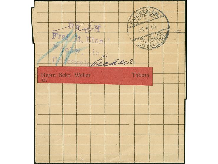 1915, “Rp (2½) H. Frei lt. Einn. Nachw. in Daressalam” violetter L4 klar auf Drucksachen-Streifband von “DARESSALAM (DOA) c 8