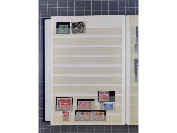 1880/1940 (ca.), interessante Partie in 6 Steckbüchern, dabei u.a. Kolonien sowie schöner Teil Infla mit vielen guten signier