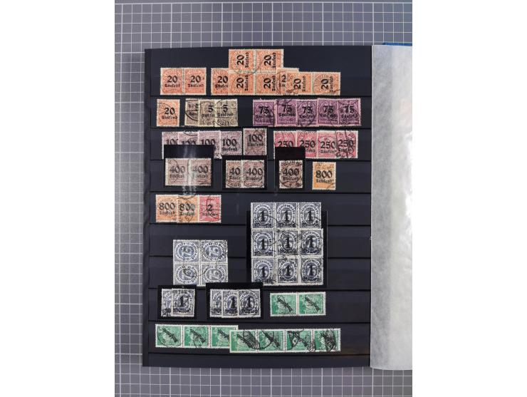 1880/1940 (ca.), interessante Partie in 6 Steckbüchern, dabei u.a. Kolonien sowie schöner Teil Infla mit vielen guten signier