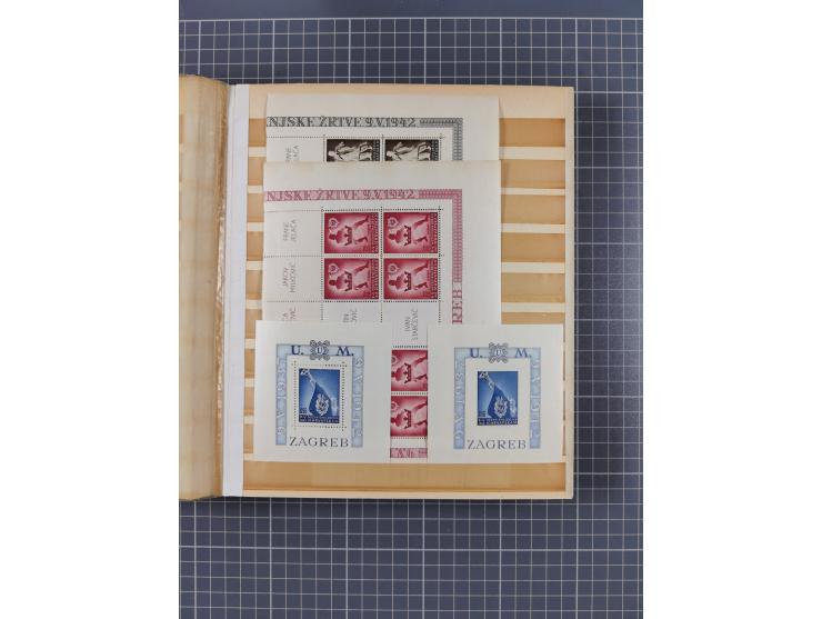 1941/45, mostly mint never hinged collection, essentially in blocks of four, including Officials and Postage dues, together w